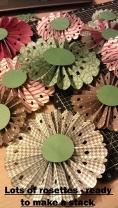 Lots of rosettes all glued to a circle top and bottom