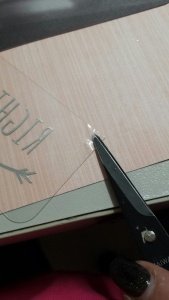 Use your scissors to peel away the protective film on the clear PML cards